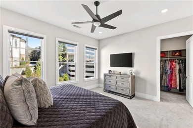 Just one year old and like new, this luxury townhome is located