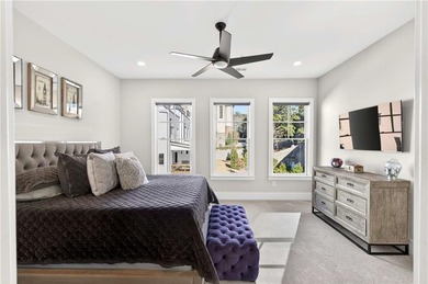 Just one year old and like new, this luxury townhome is located