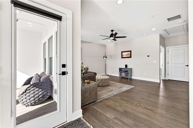 Just one year old and like new, this luxury townhome is located