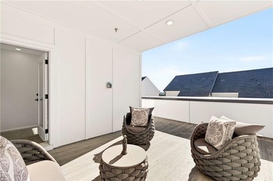 Just one year old and like new, this luxury townhome is located