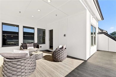 Just one year old and like new, this luxury townhome is located