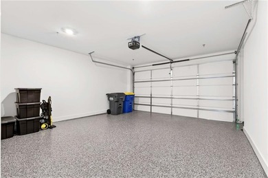 Just one year old and like new, this luxury townhome is located