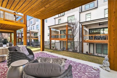 Just one year old and like new, this luxury townhome is located