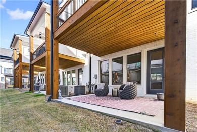 Just one year old and like new, this luxury townhome is located