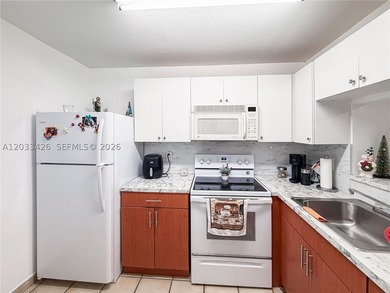 Well-maintained and spacious 2-bedroom, 2-bathroom condo located - photo 12