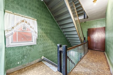 Great opportunity to own a spacious three-family home in the Van - photo 14