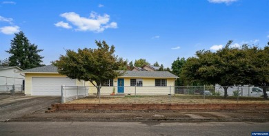 Spacious home on a large lot located in the Gubser school