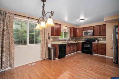 Spacious home on a large lot located in the Gubser school