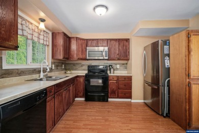 Spacious home on a large lot located in the Gubser school