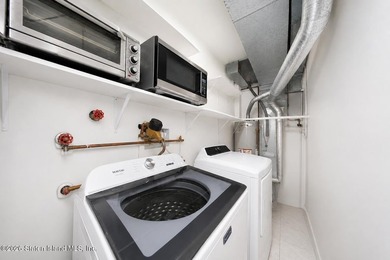 Modern 2-bedroom Condo with a front yard porch. The open concept - photo 14