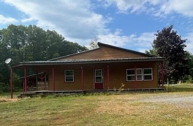 Manhanock Pond Home For Sale in Sangerville Maine