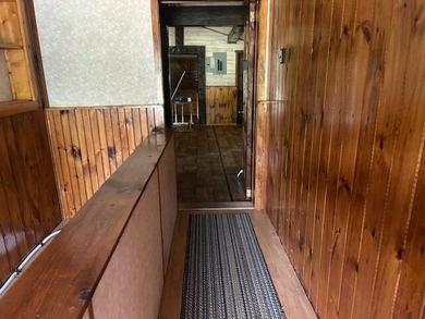 Two bedroom, one bathroom,single story home sits on a large open - photo 7