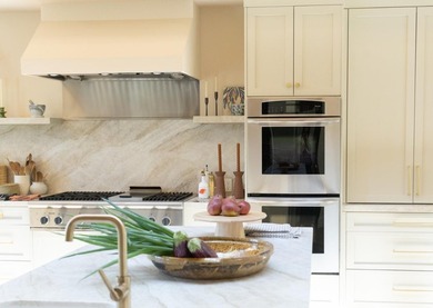 Set amongst the oaks, this stunning home connects the interior - photo 11