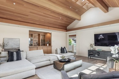 Set amongst the oaks, this stunning home connects the interior - photo 15