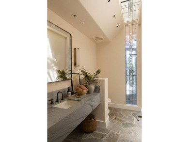 Set amongst the oaks, this stunning home connects the interior - photo 17