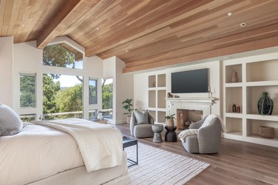Set amongst the oaks, this stunning home connects the interior - photo 18