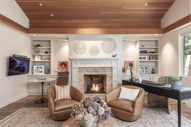 Set amongst the oaks, this stunning home connects the interior - photo 24
