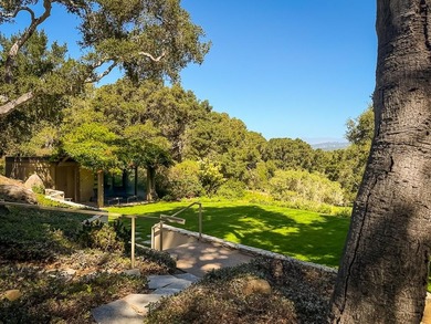 Set amongst the oaks, this stunning home connects the interior - photo 34