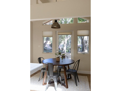Set amongst the oaks, this stunning home connects the interior - photo 40