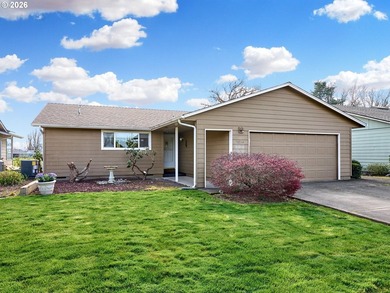 Located in the sought-after Woodburn Senior Estates, this home - photo 1