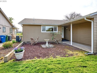 Located in the sought-after Woodburn Senior Estates, this home - photo 2
