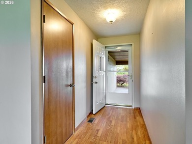 Located in the sought-after Woodburn Senior Estates, this home - photo 3