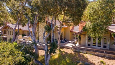 Set amongst the oaks, this stunning home connects the interior - photo 44