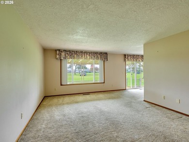 Located in the sought-after Woodburn Senior Estates, this home - photo 5