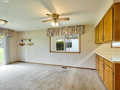 Located in the sought-after Woodburn Senior Estates, this home - photo 8