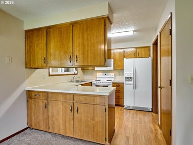 Located in the sought-after Woodburn Senior Estates, this home - photo 10