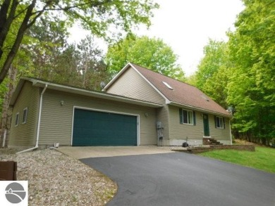 Lake Home For Sale in Rapid City, Michigan