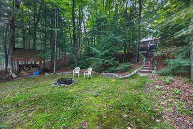 Peaceful waterfront living awaits on Dark Lake! This beautifully - photo 13