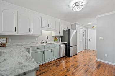 Welcome to 101 Brittany Park, a beautifully updated 4-bedroom, 3 - photo 13