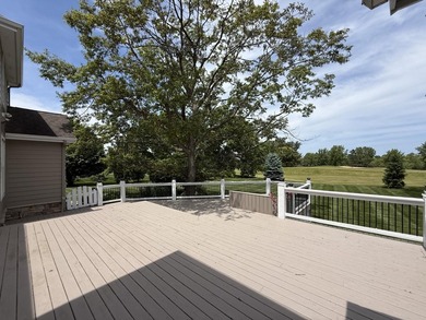 Perfectly positioned along the fairway in the gated Sand Creek - photo 4