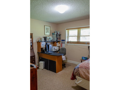 Welcome to this charming ranch-style brick home nestled on a - photo 19
