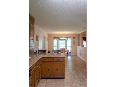 Welcome to this charming ranch-style brick home nestled on a - photo 29