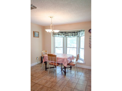 Welcome to this charming ranch-style brick home nestled on a - photo 30