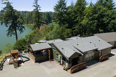 Drive-to Tenmile Lake waterfront retreat with rare boathouse and - photo 1