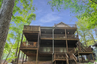 Discover your dream retreat with this stunning lake area home - photo 2