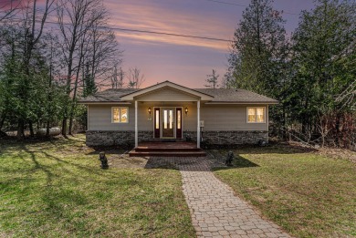Lake Home For Sale in Elmira, Michigan