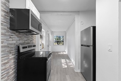 ABSOLUTELY GORGEOUS TRIPLEX | PRIME PALM BEACH LOCATION | HUGE - photo 12