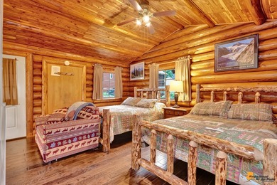 Gwin's Lodge is a historic pioneer-built log roadhouse from the - photo 12