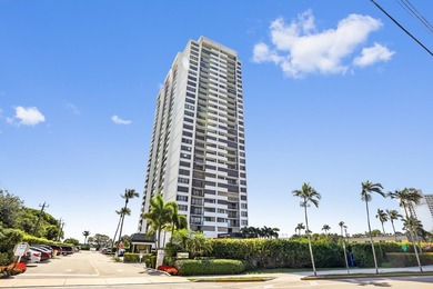 Experience coastal luxury in this gated condo at Palm Beach - photo 2