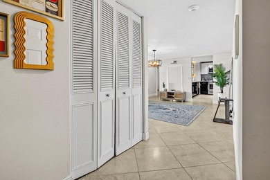 Experience coastal luxury in this gated condo at Palm Beach - photo 4