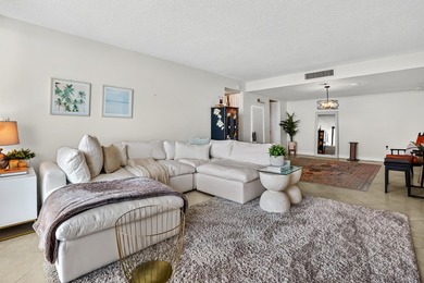 Experience coastal luxury in this gated condo at Palm Beach - photo 8