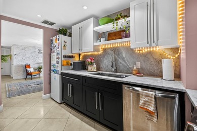 Experience coastal luxury in this gated condo at Palm Beach - photo 9