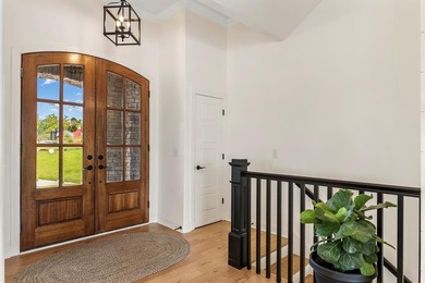 PRICE ENHANCEMENT on this Stunning Lakefront Home. Home is 2 - photo 8
