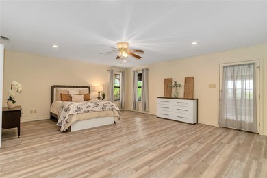 Nestled on a scenic half-acre riverfront lot in Pecan Plantation - photo 6