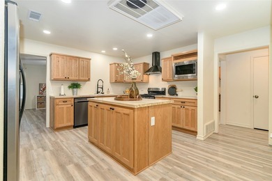 Nestled on a scenic half-acre riverfront lot in Pecan Plantation - photo 10