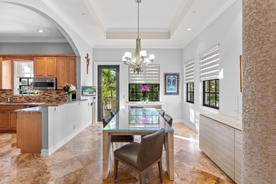 In the heart of vibrant Delray Beach, just steps from iconic